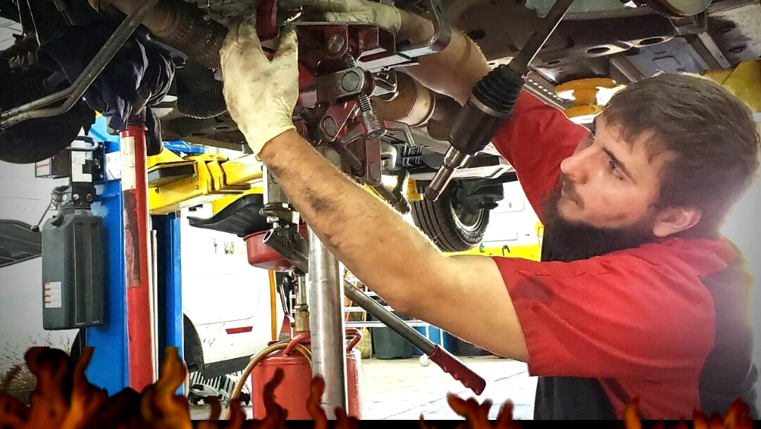 Madd Monkey Garage technician performing an automotive repair